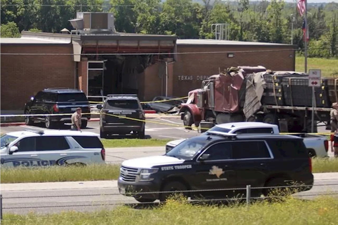 1 dead and 13 injured after semitrailer intentionally crashed into Texas public safety office