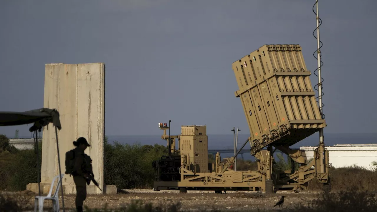 Israel's Air Defense System Faces Incoming Attack by Iranian Drones and Ballistic Missiles