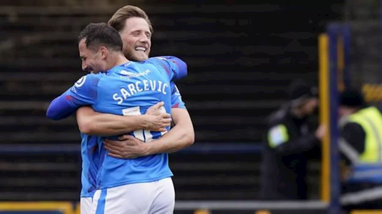 Stockport promoted to League One after beating Morecambe