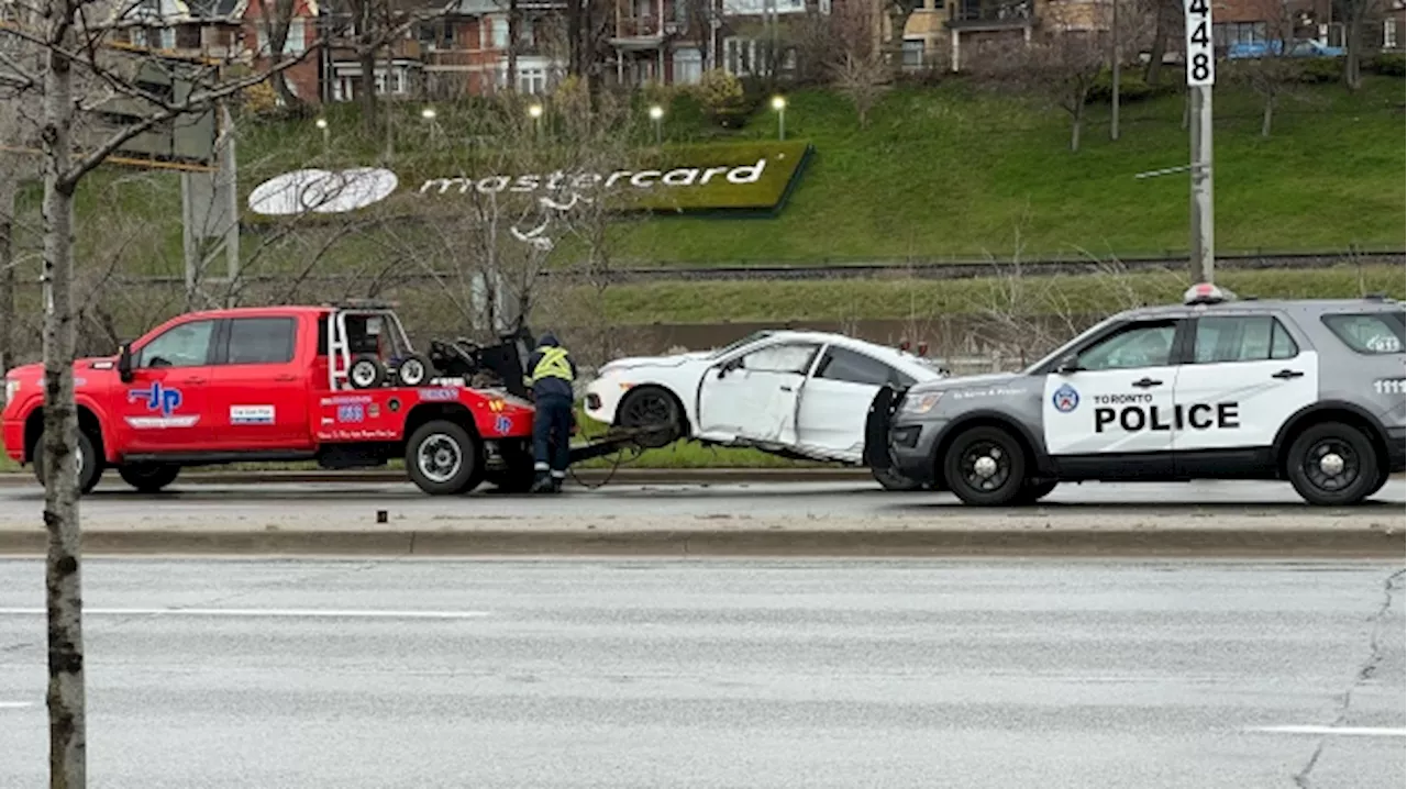 Driver transported to hospital after crash knocks down 2 light posts