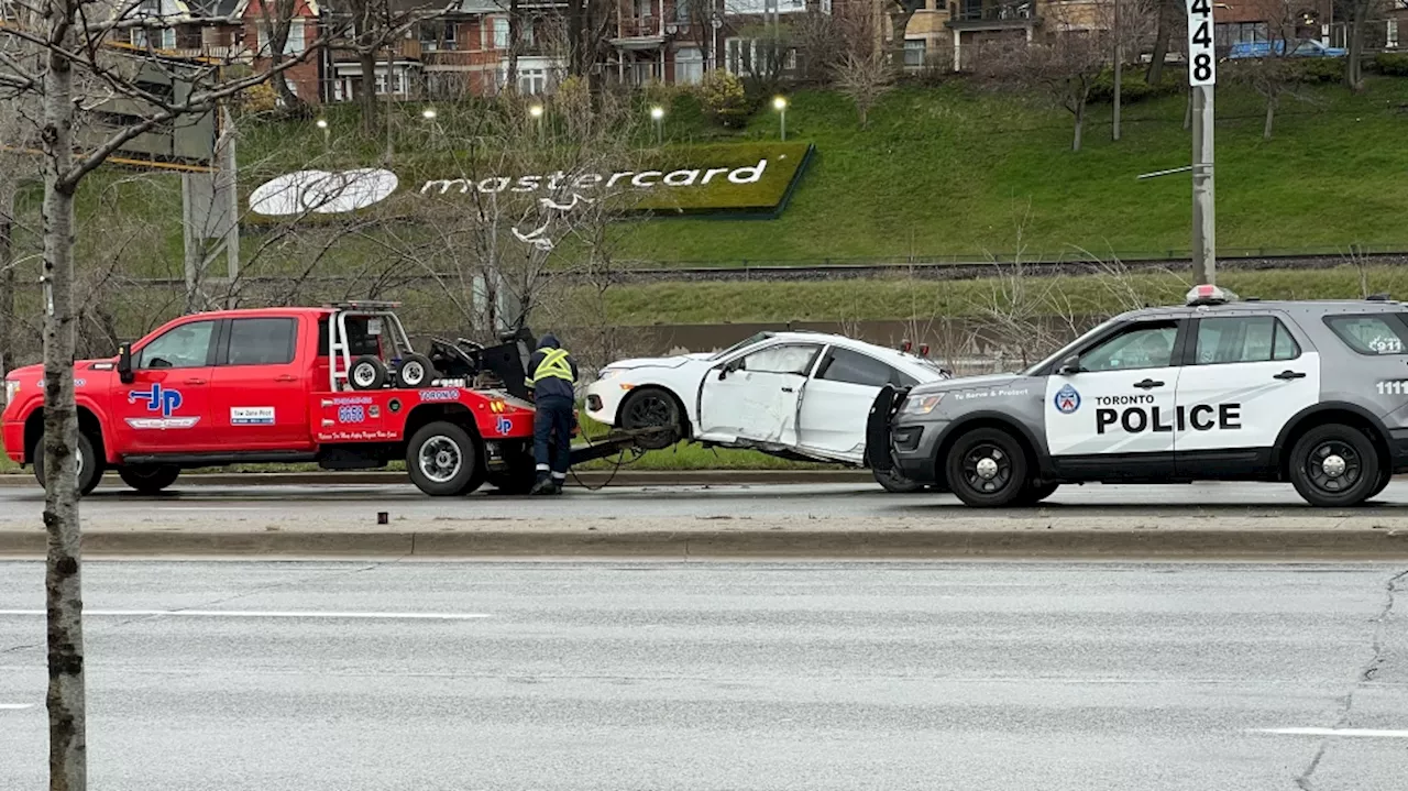 Driver transported to hospital after crash knocks down 2 light posts