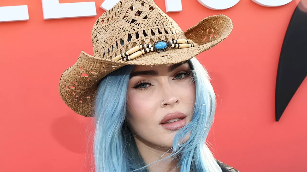 Megan Fox shows off new blue hair as she arrives to Coachella party