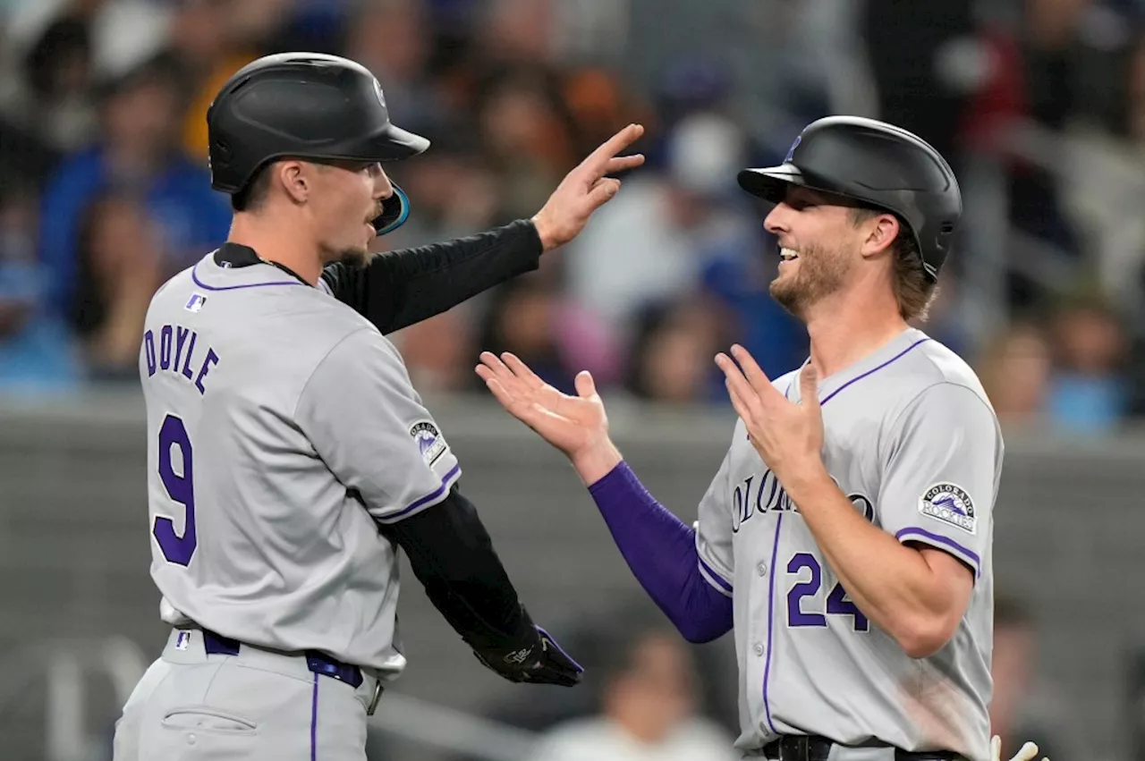 Rockies rout Blue Jays with 20-hit breakout on the road