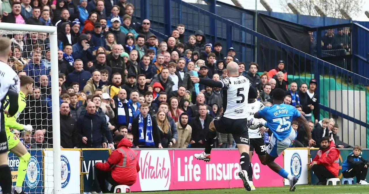 Stockport County promoted to League One after win over Morecambe