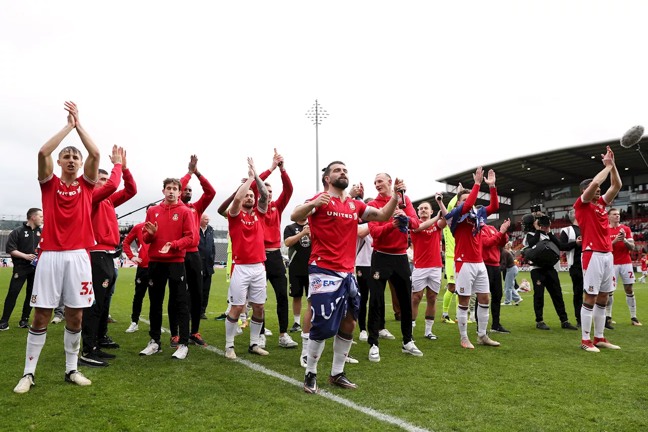 Ryan Reynolds celebrates ‘ride of our lives' as Wrexham gains promotion to English 3rd division