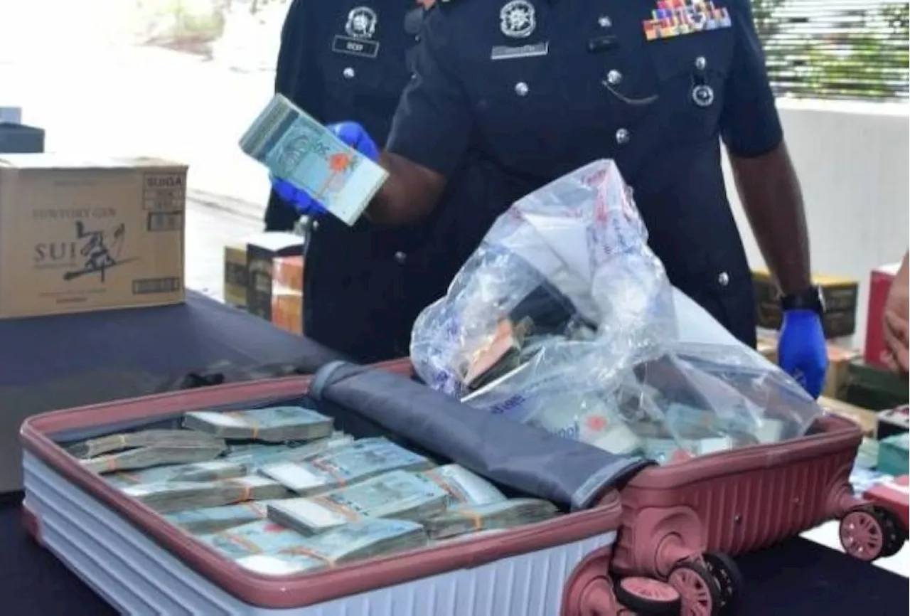 Cops to record statements of three over suitcase containing RM500,000