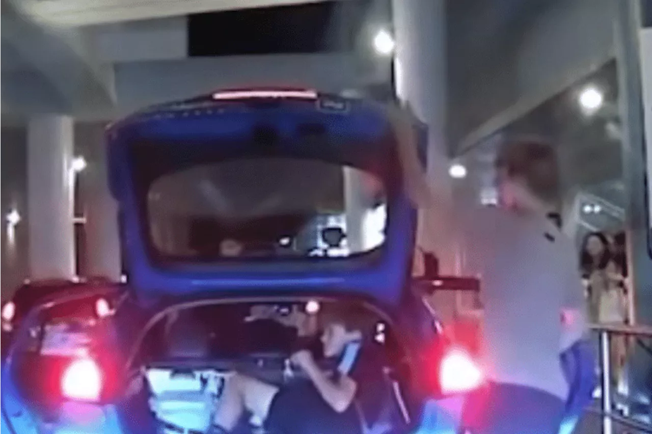 Passenger seen getting into boot of ComfortDelGro taxi in Singapore
