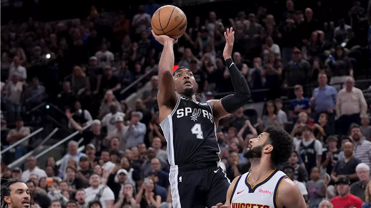 Graham, Spurs stun Nuggets, who fall into a three-way tie atop West