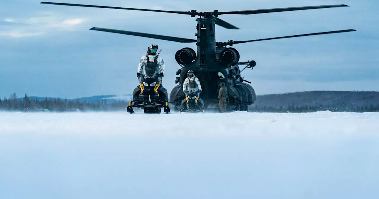 Navy SEALs Parachute into Freezing Waters in Special Operations Exercise