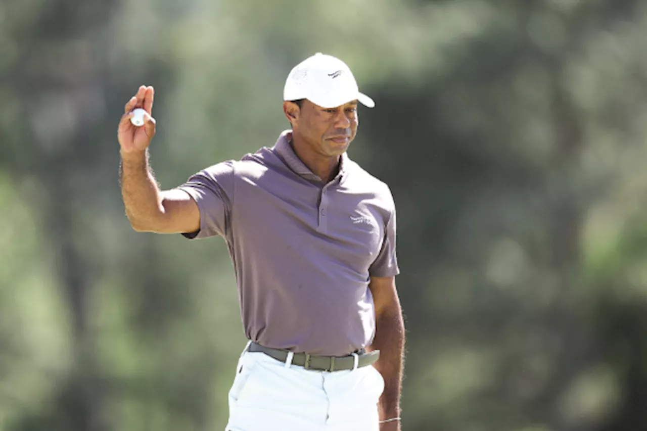 Trio ahead as Woods grinds it out