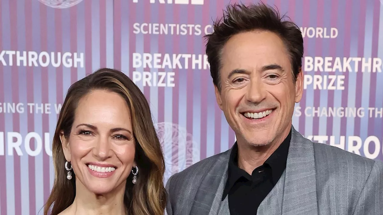 Robert Downey Jr. poses with glamorous wife Susan as they join A-listers in honoring luminaries in...