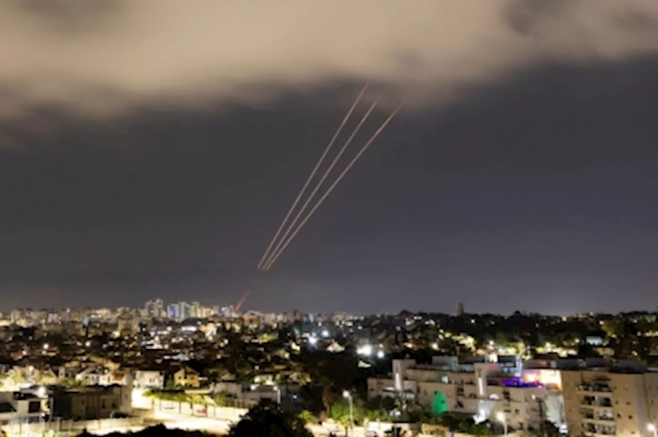 Iran launches unprecedented strikes on Israel, opening wider conflict