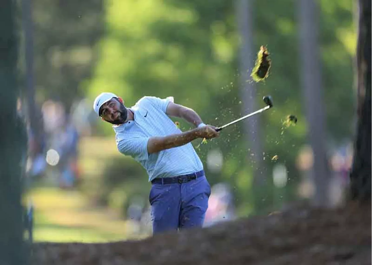 Scheffler grabs Masters’ lead, Tiger fires awful 82