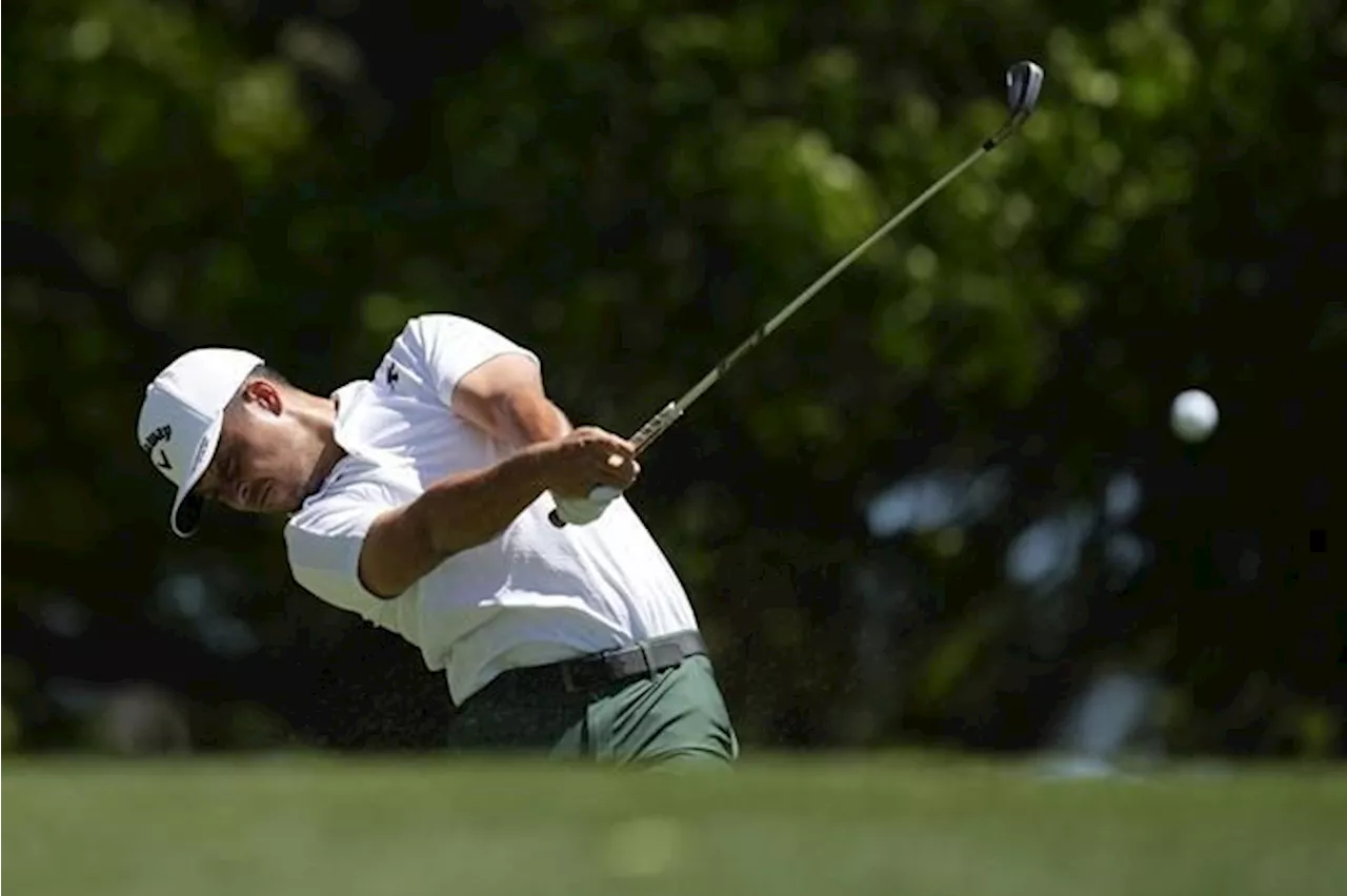 Scottie Scheffler leads Masters by 1 shot on a wild day of movement