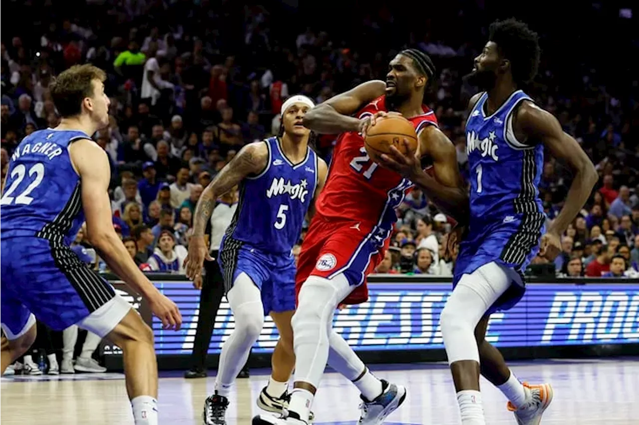 Sixers center Joel Embiid exits game briefly with knee injury, returns after halftime