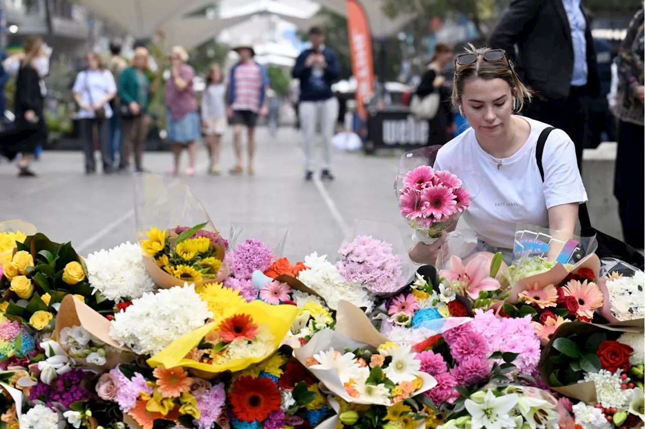 Sydney police officer who shot dead mall attacker praised for courage