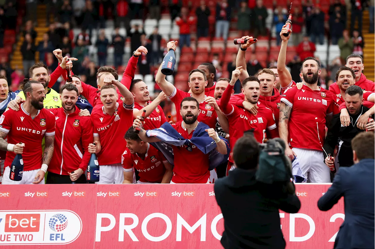 Wrexham Fans Celebrate Promotion with Chants and Songs