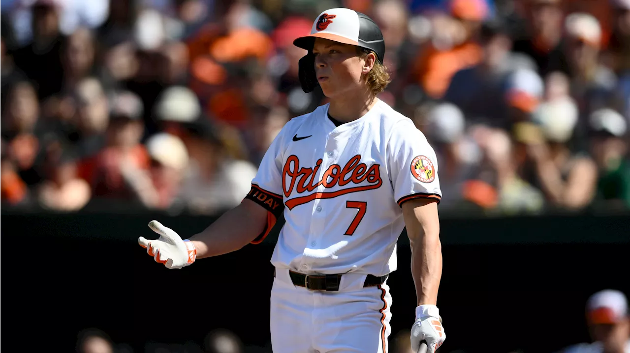 Holliday's first hit helps Orioles rally past Brewers