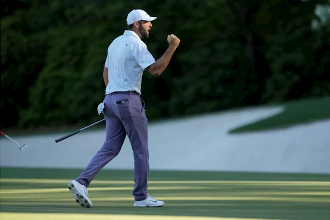 Scottie Scheffler leads Masters by 1 shot on a wild day of movement