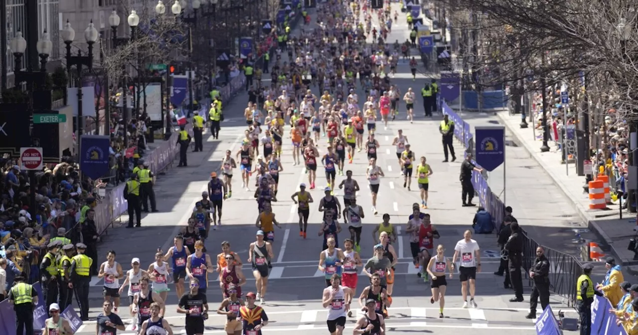 Golden retrievers gather ahead of Boston Marathon to honor Spencer