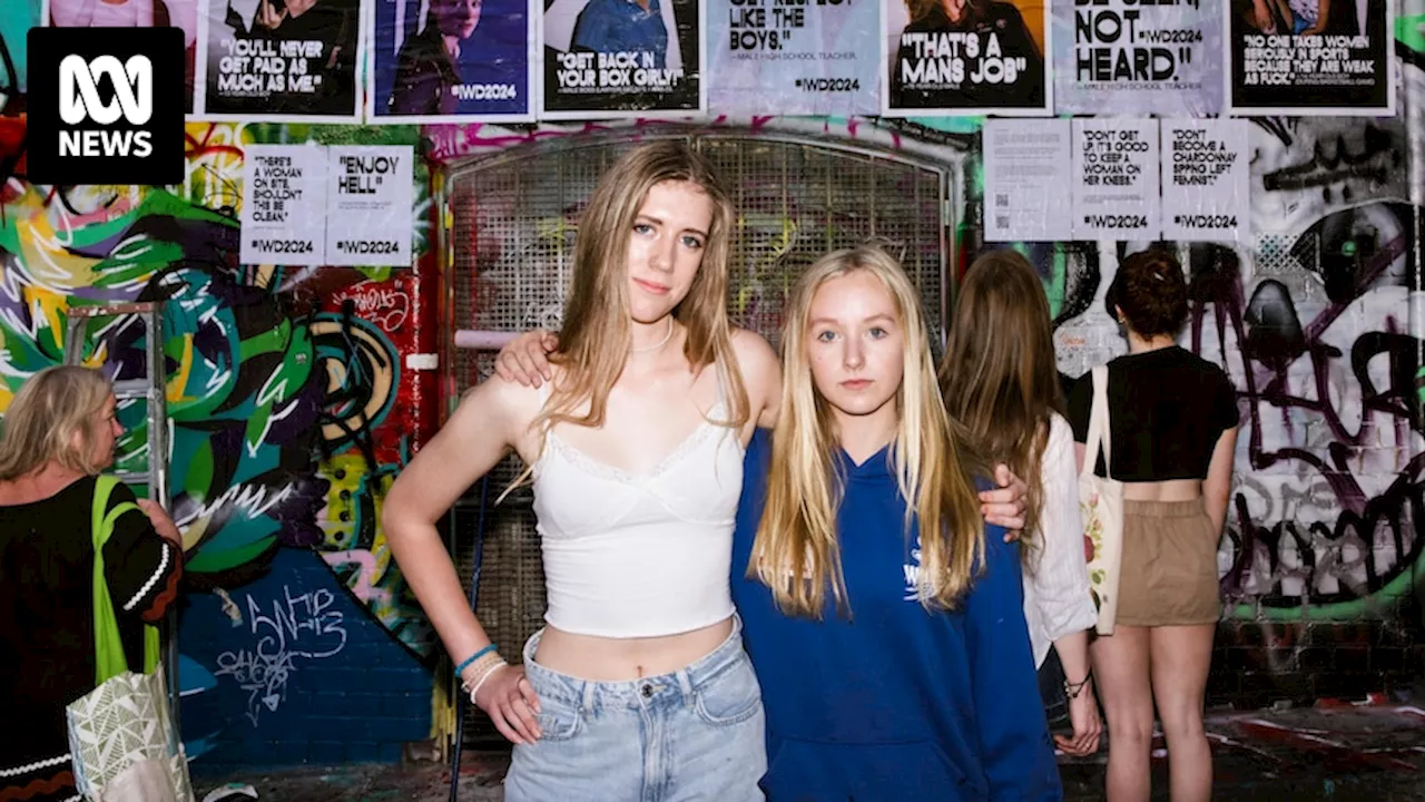 Teen girls post artwork in Melbourne's Hosier Lane, documenting classroom sexism, misogyny