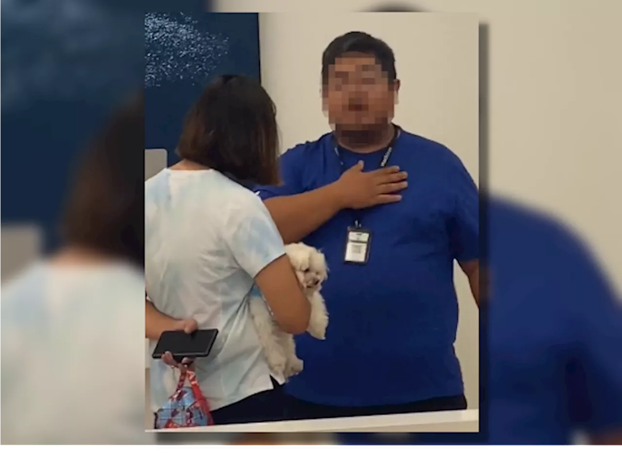 Woman argues with gadget shop employee for bringing her dog into the store