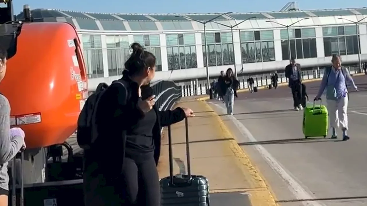 40 protesters arrested outside O'Hare Airport for blocking traffic; forcing people to walk to terminals