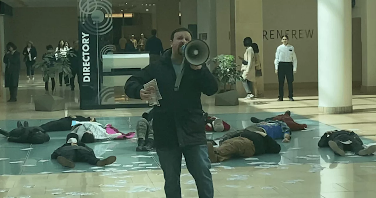 Pro-Palestine protesters escorted out of downtown Calgary mall after allegedly vandalizing bookstore