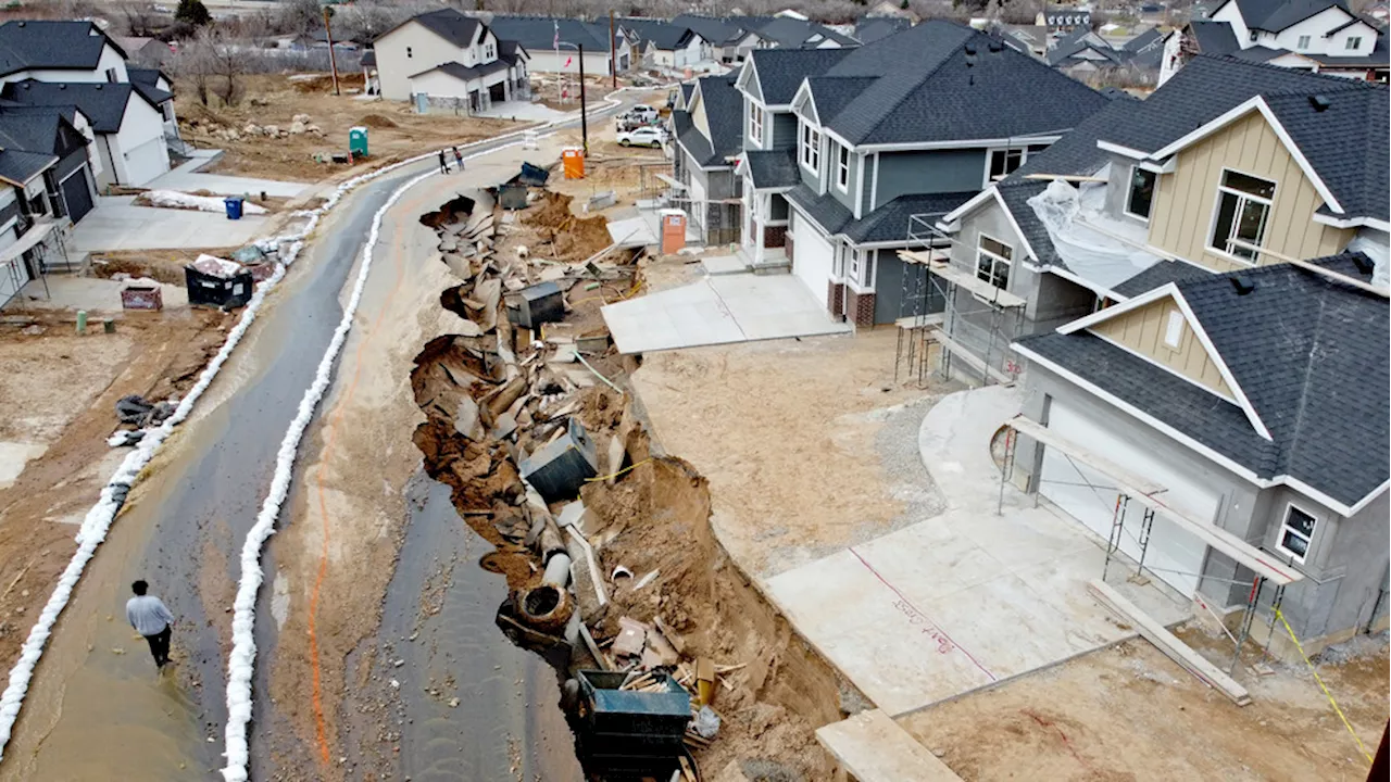 Kaysville residents reflect one year after flooding left sinkholes, ravines through street