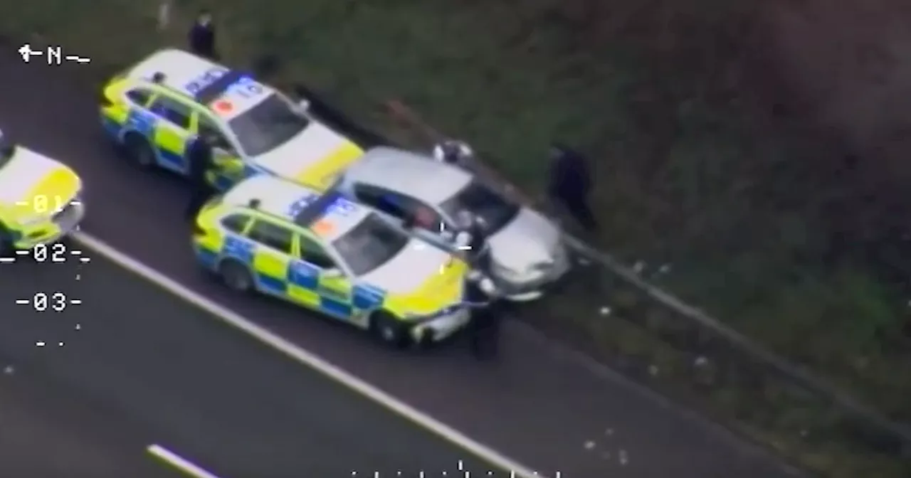 Police chase video shows burglar being rammed off motorway