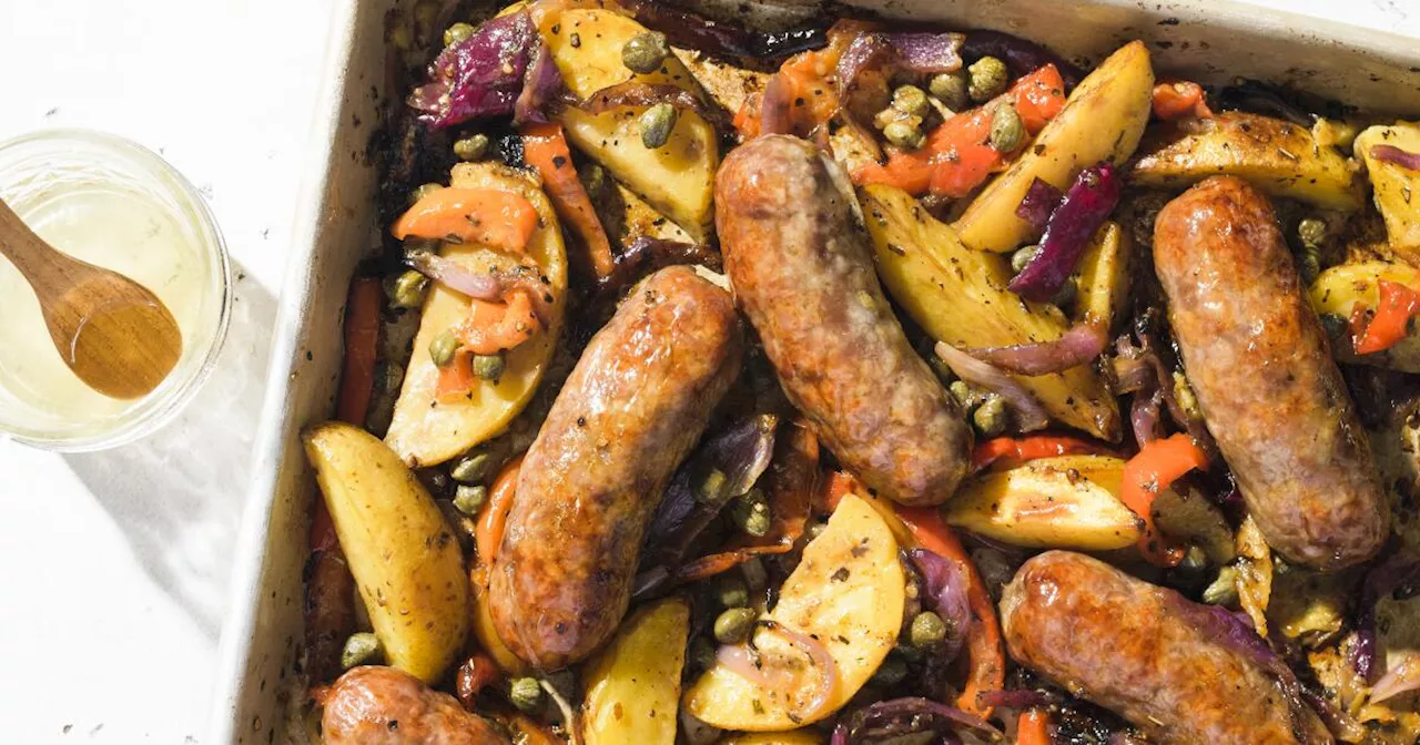 Roast Italian sausages over potatoes and peppers for a flavorful one-pan supper