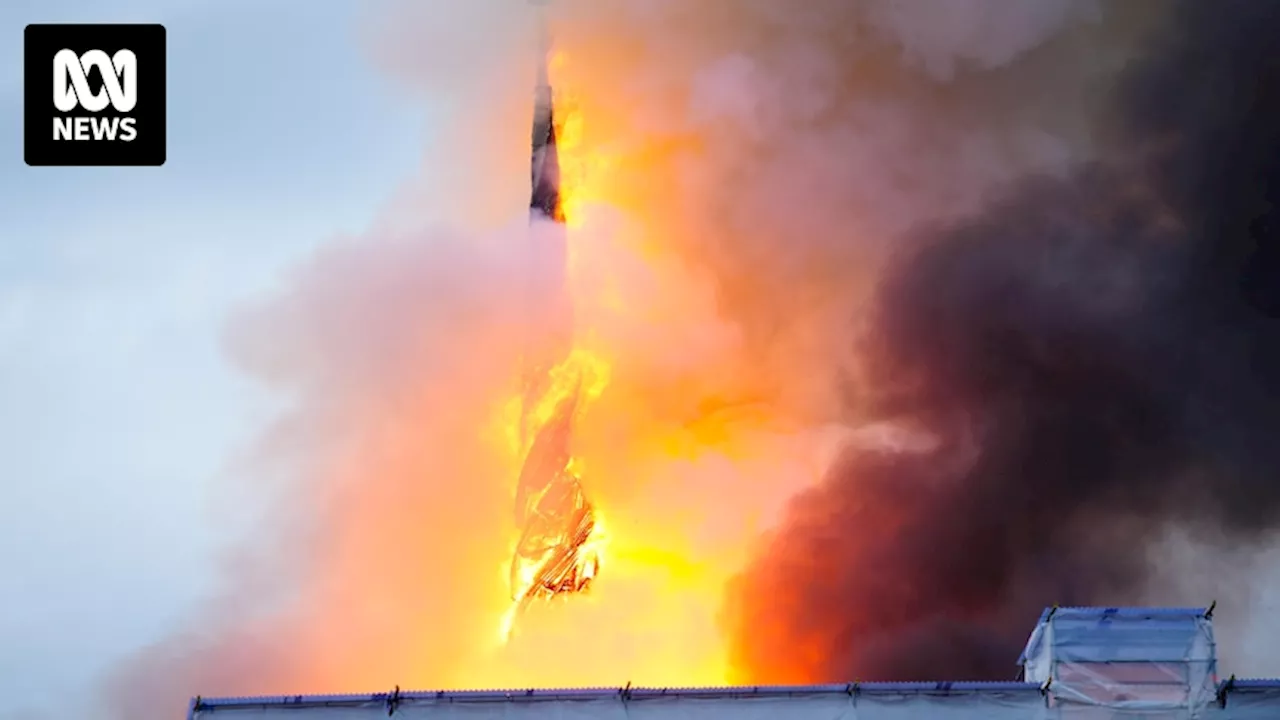 Spire collapses after fire breaks out at Copenhagen's 17th-century Old Stock Exchange