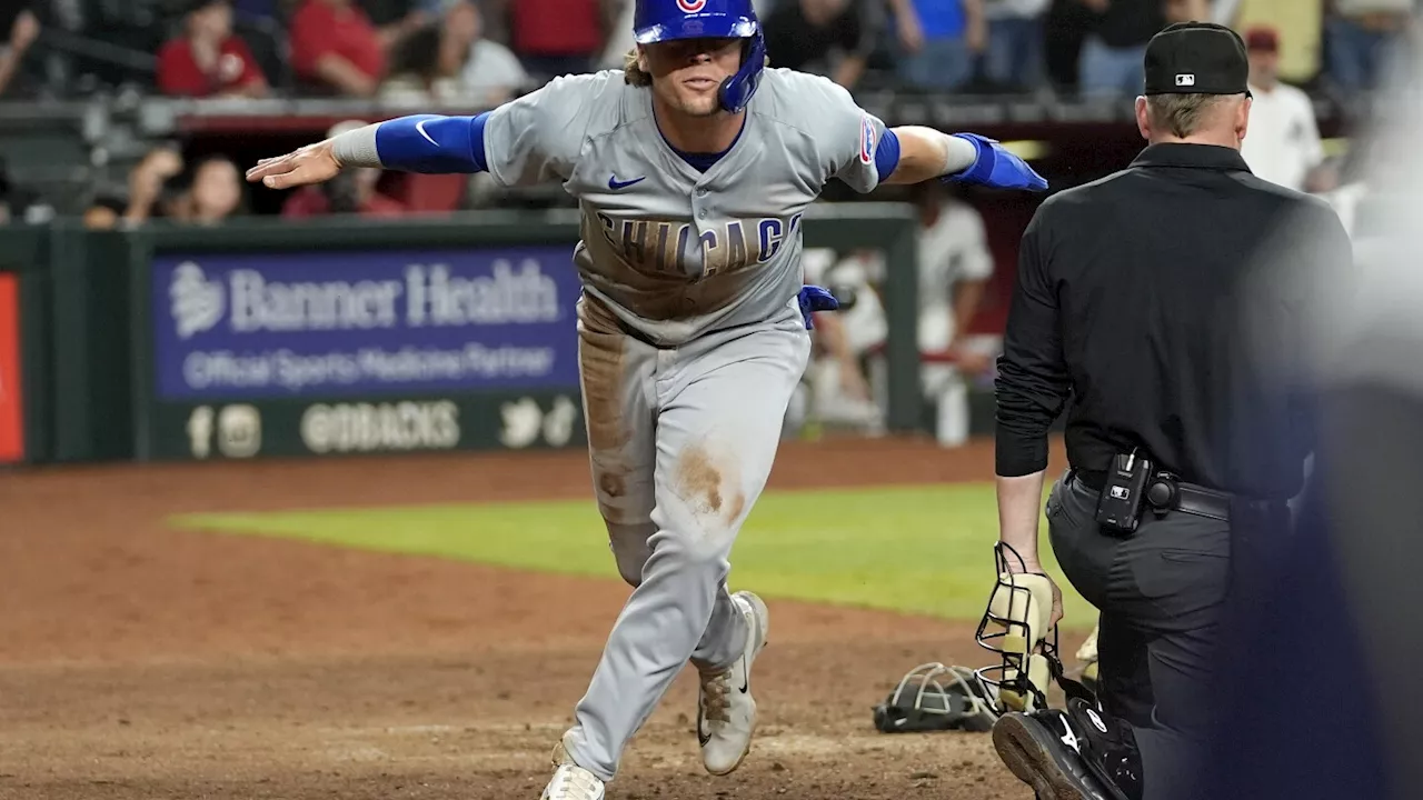 Nico Hoerner's tying dash and go-ahead single rally Cubs past Diamondbacks 3-2 in 11 innings