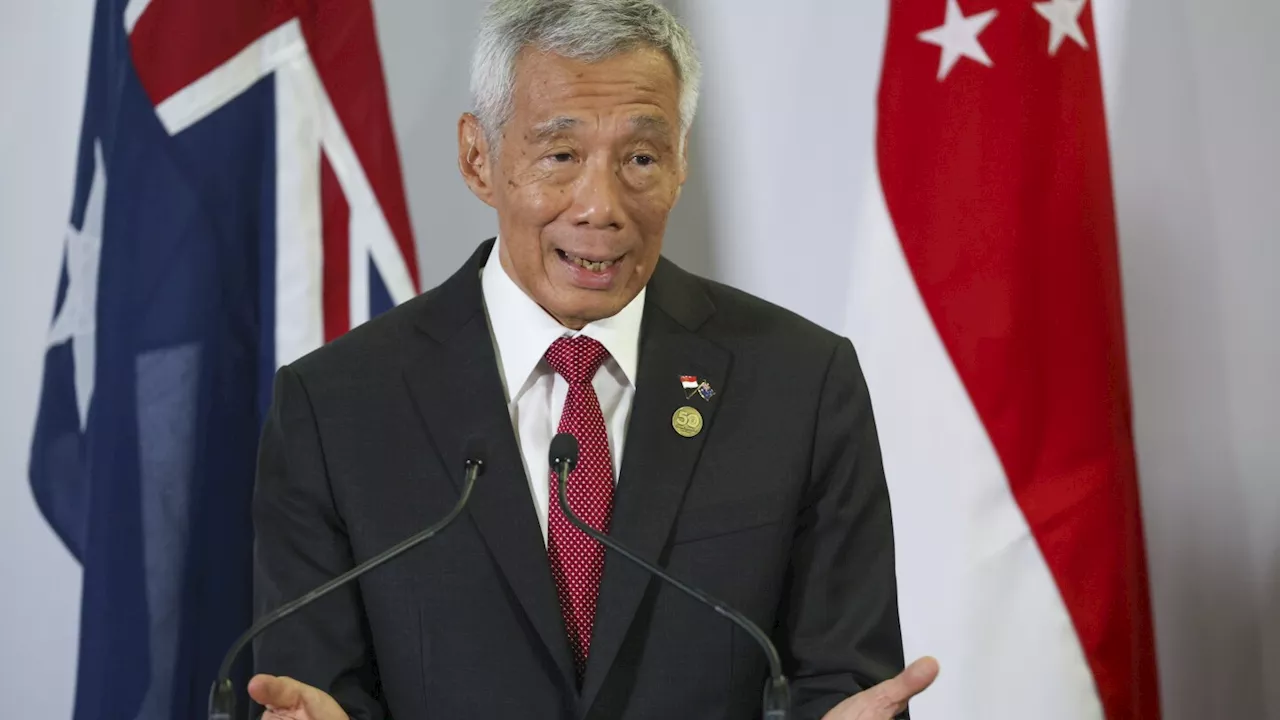 Singapore's outgoing prime minister will stay on as senior minister, his successor says