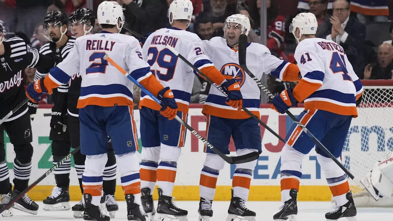 The New York Islanders clinch a playoff spot in the Eastern Conference with 4-1 win over Devils