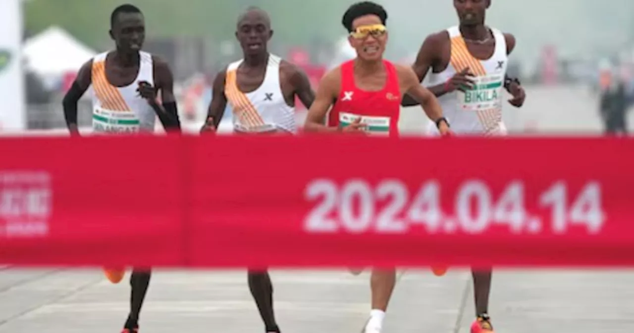 Online videos show Chinese runner being gifted win in Beijing half marathon