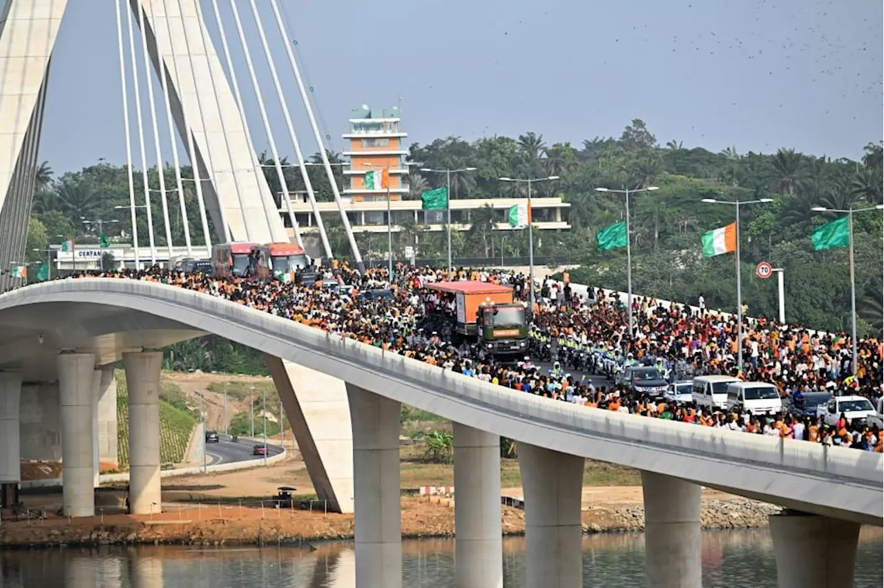 Behind the growth, Ivory Coast's debt fuels debate