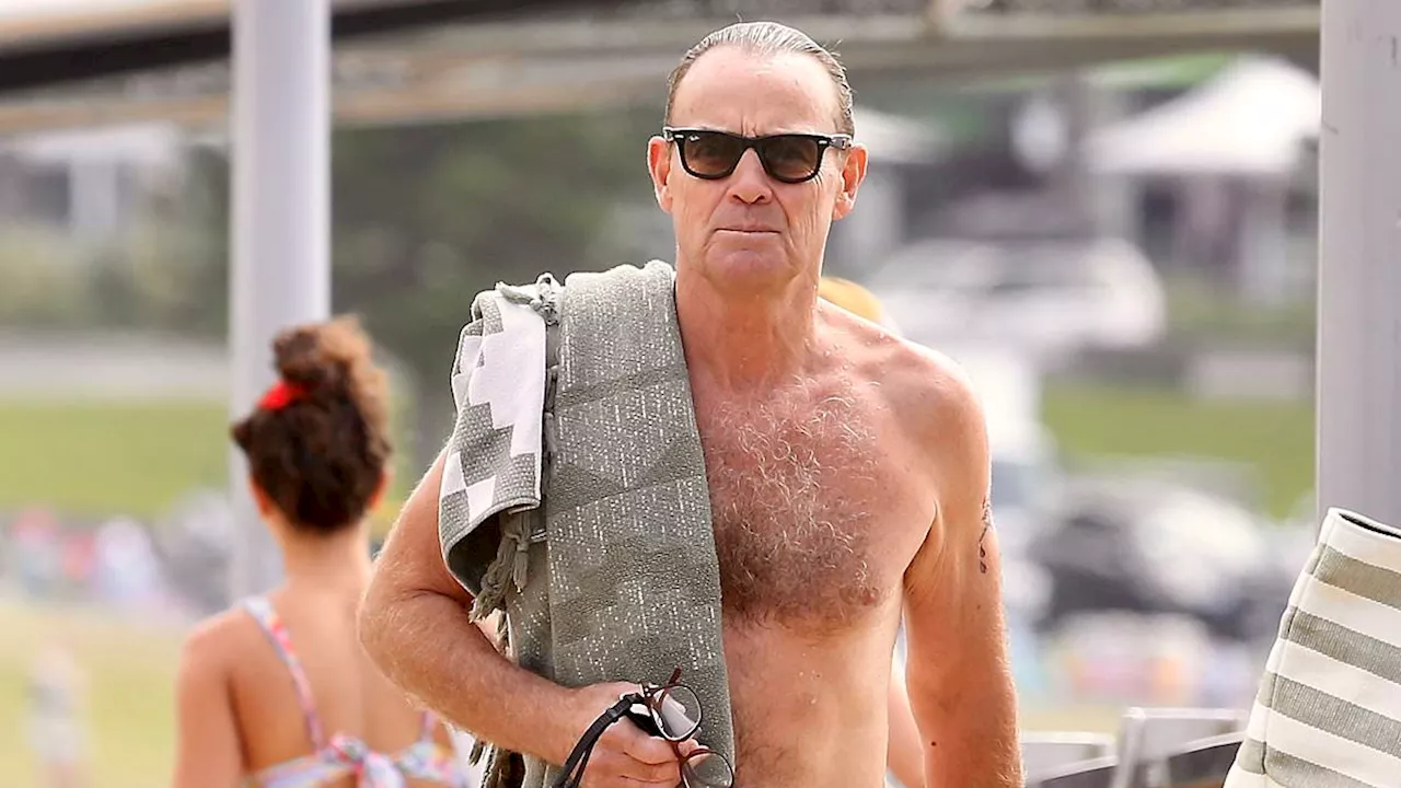 Neighbours icon Jason Donovan, 55, shows off his toned physique in a pair of cheeky budgie...