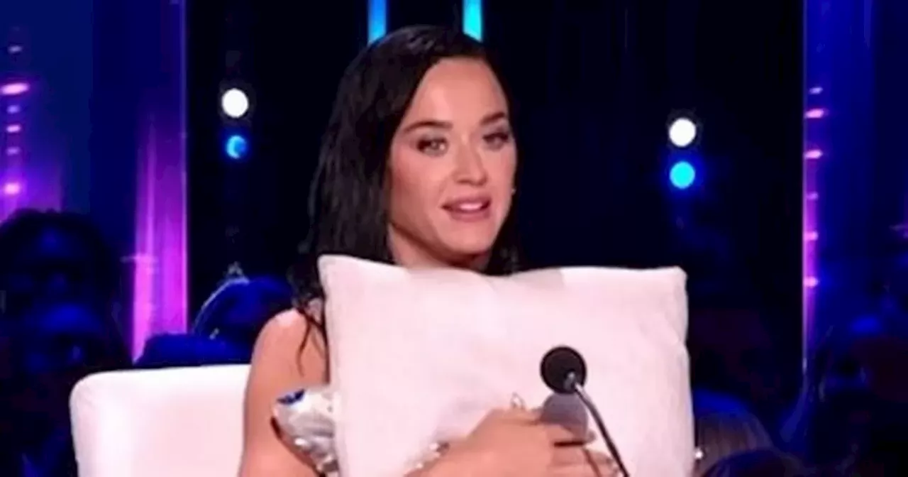 Katy Perry suffers huge wardrobe malfunction as Luke Bryan rushes to help