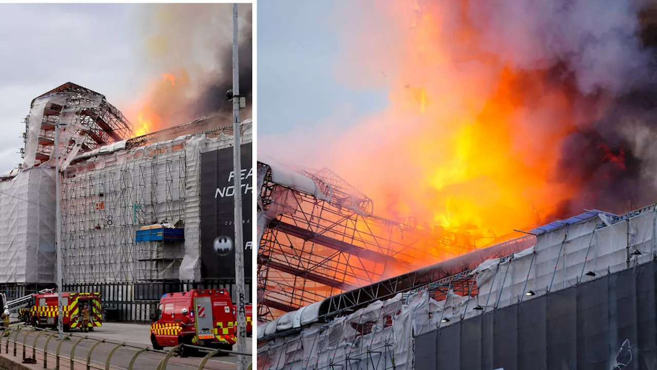 Copenhagen's historic stock exchange goes up in flames as footage shows moment iconic spire collapses