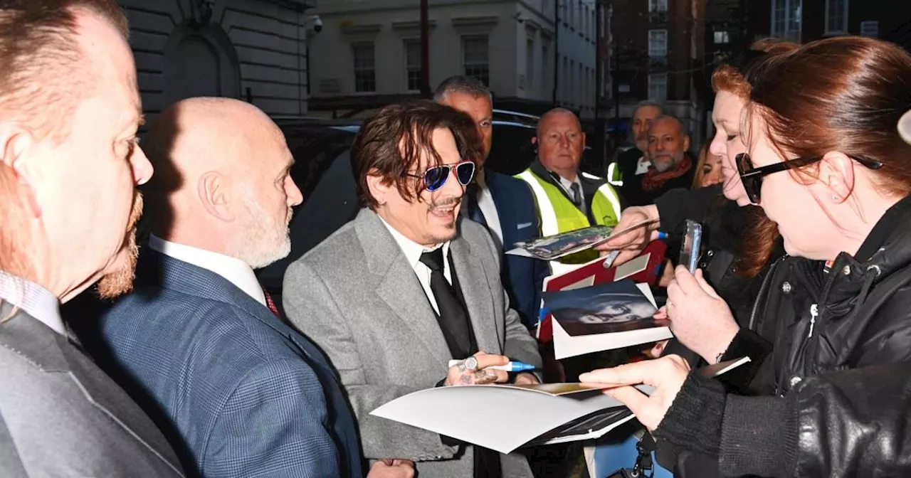 Johnny Depp shows yellowing smile at first UK premiere since Amber Heard trial