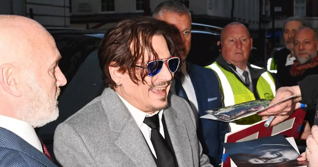 Johnny Depp shows yellowing smile at first UK premiere since Amber Heard trial