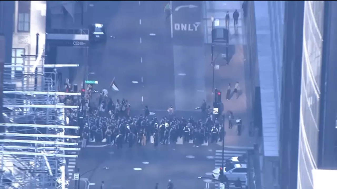 At least 50 people arrested after protests disrupt traffic in downtown Chicago, near O'Hare Airport