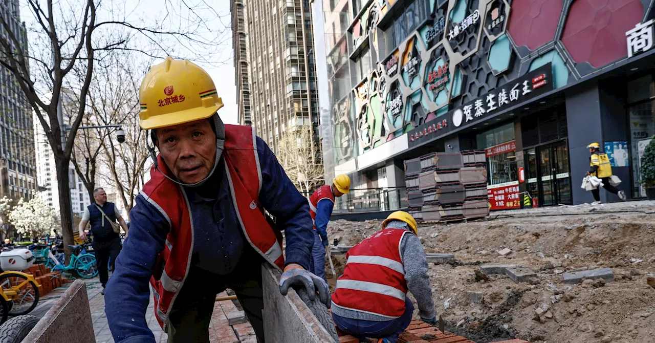 China's Q1 GDP growth solid but March data shows feeble demand