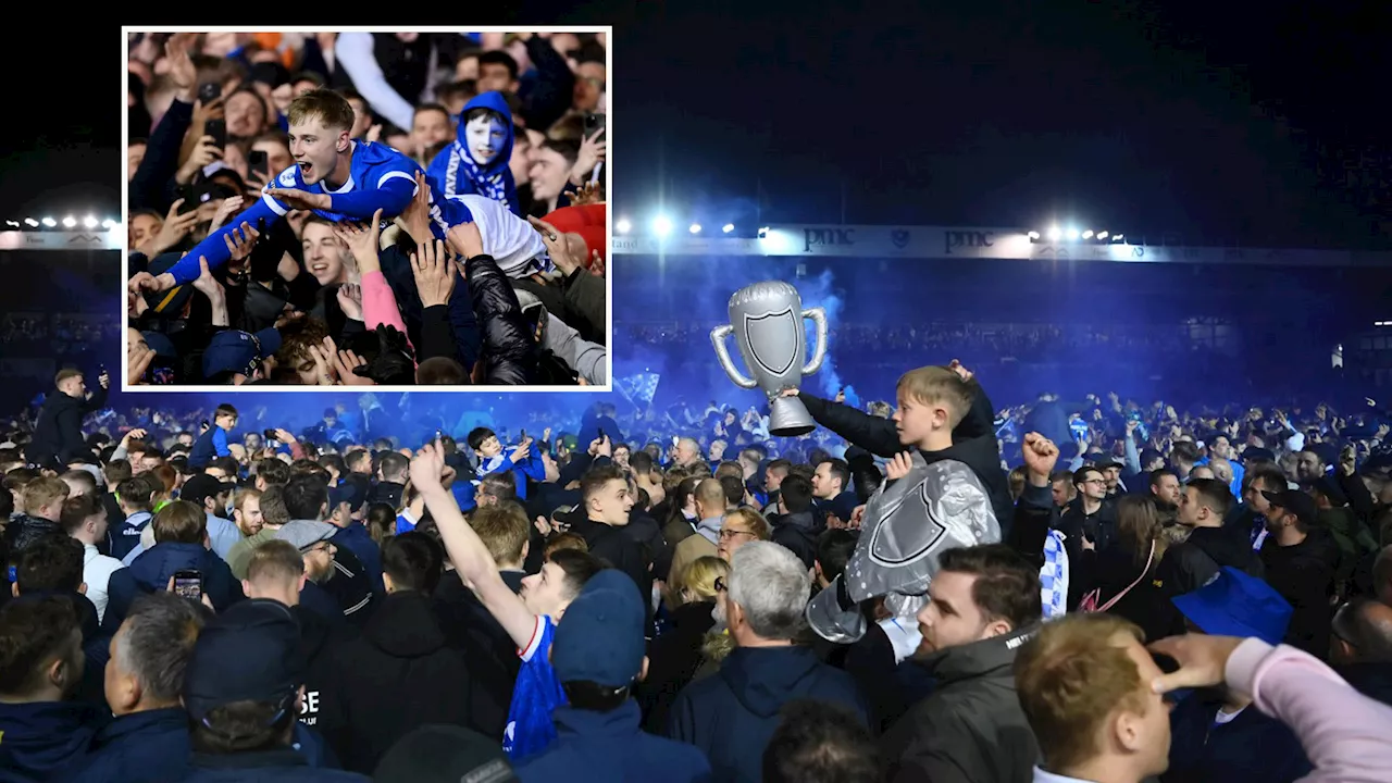 Thousands of fans flood onto Fratton Park pitch as Portsmouth return to Championship after 12 seasons away...