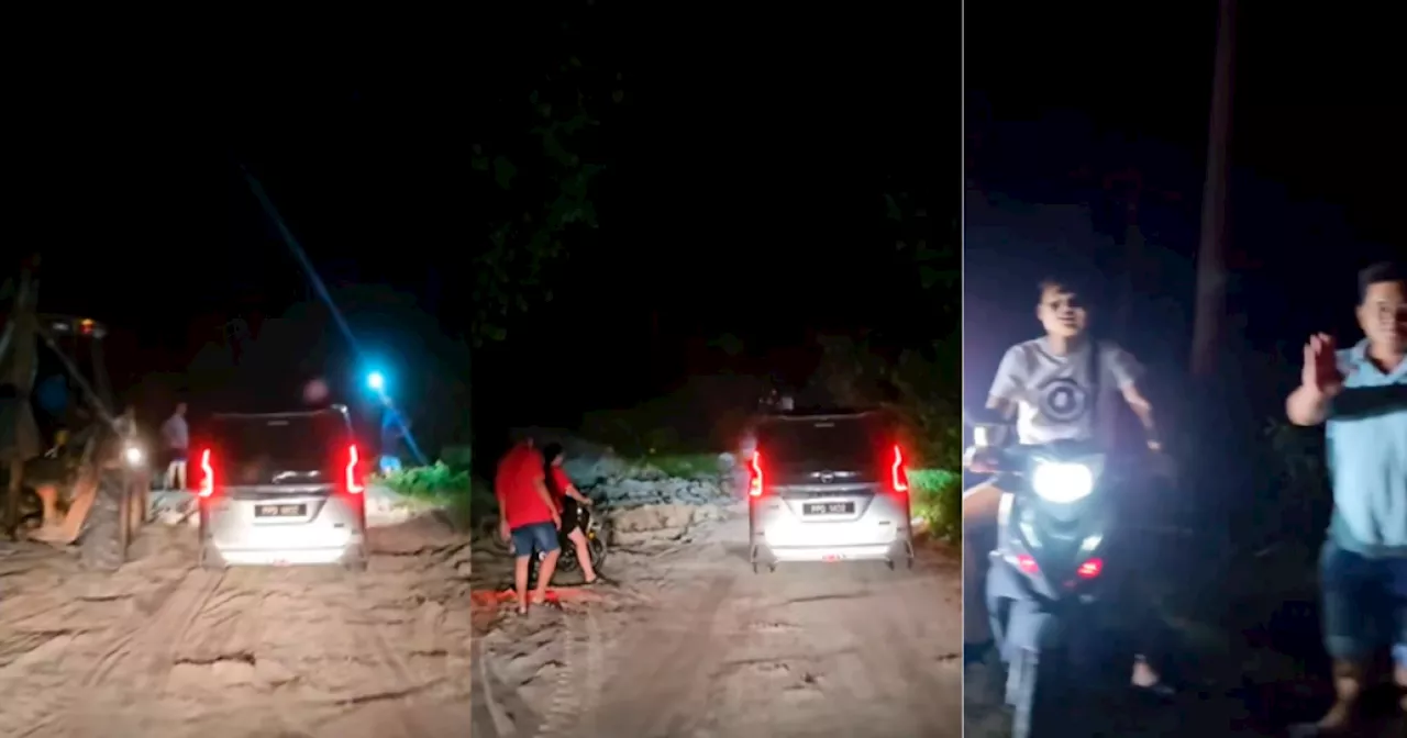 Residents of Chinese village come together to repair impassable road