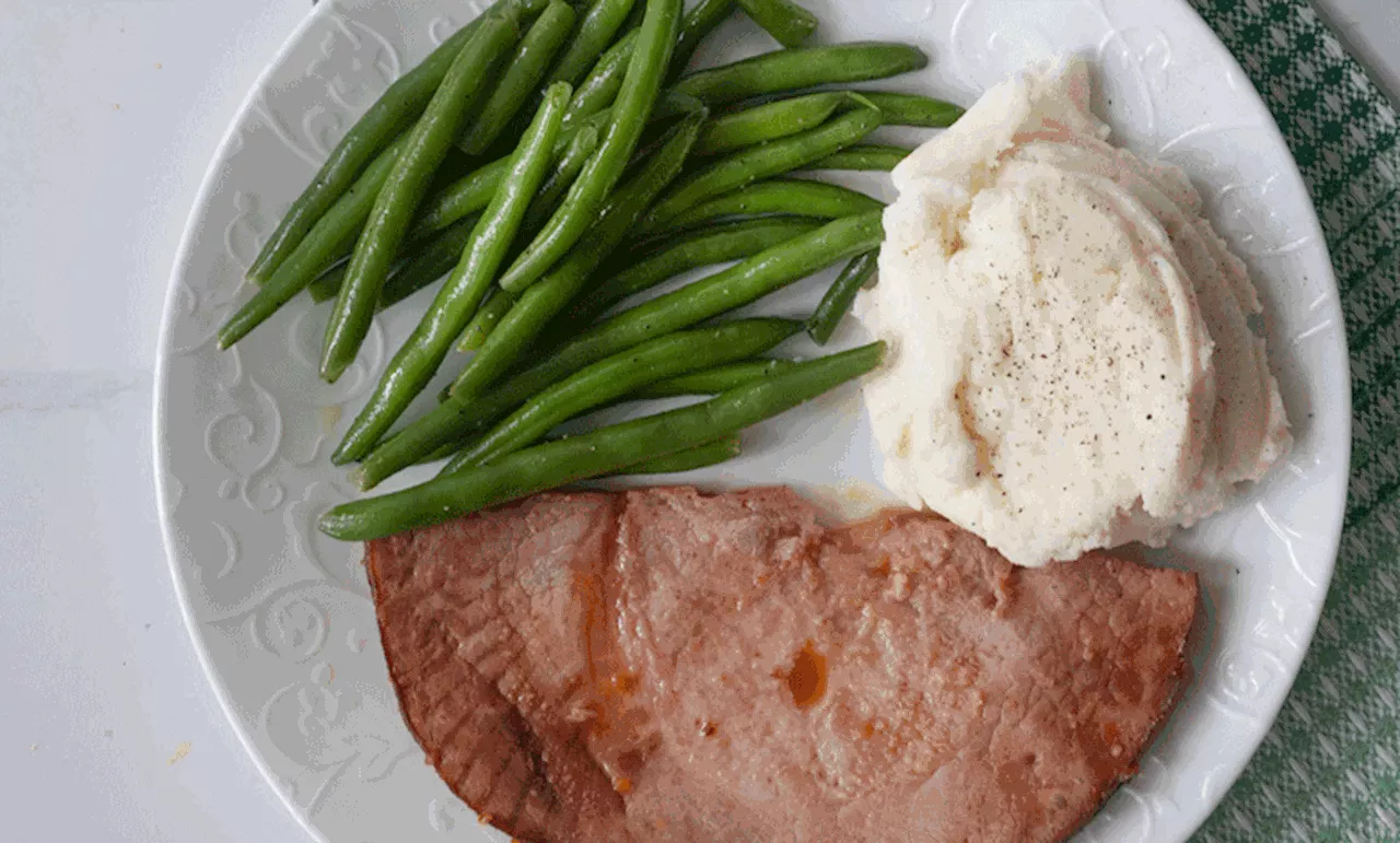 Orange honey glazed ham, green beans, and mashed potatoes