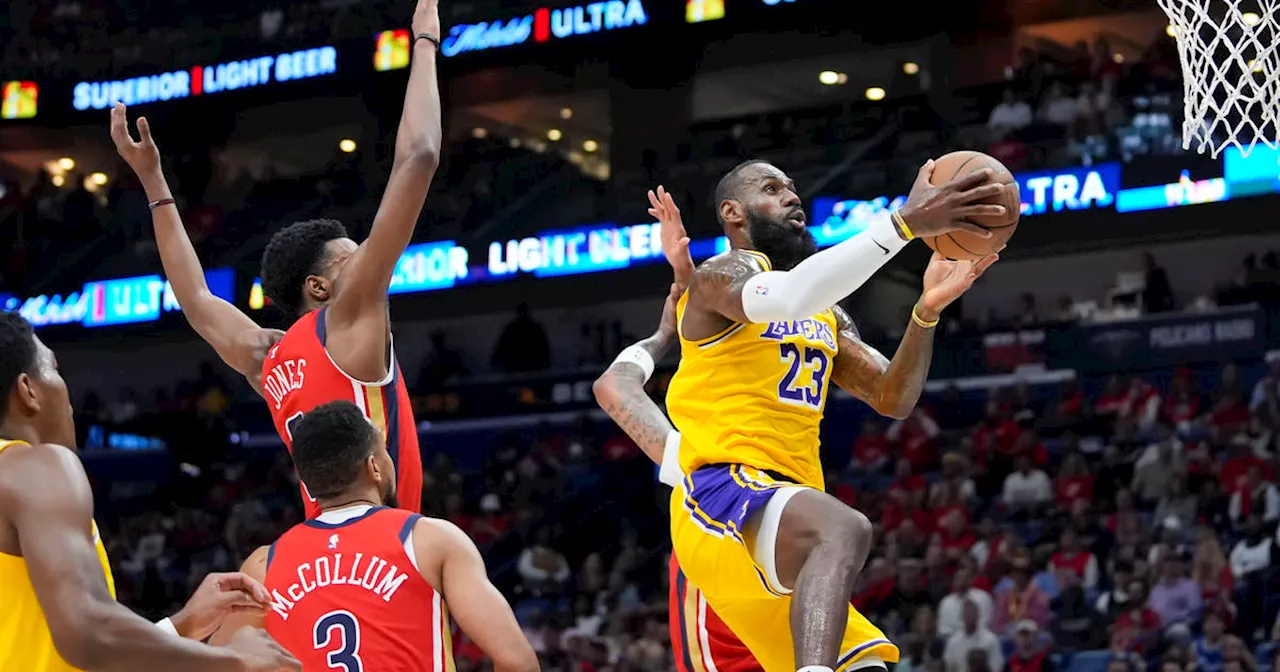 LeBron James and the Lakers secure a playoff berth with 110-106 win over the Pelicans