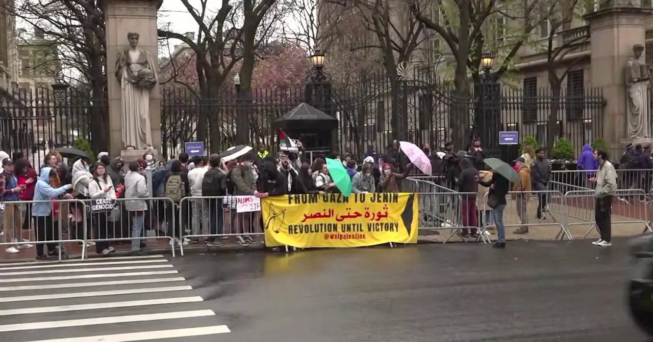 Pro-Palestinian, pro-Israeli demonstrators face off outside Columbia University