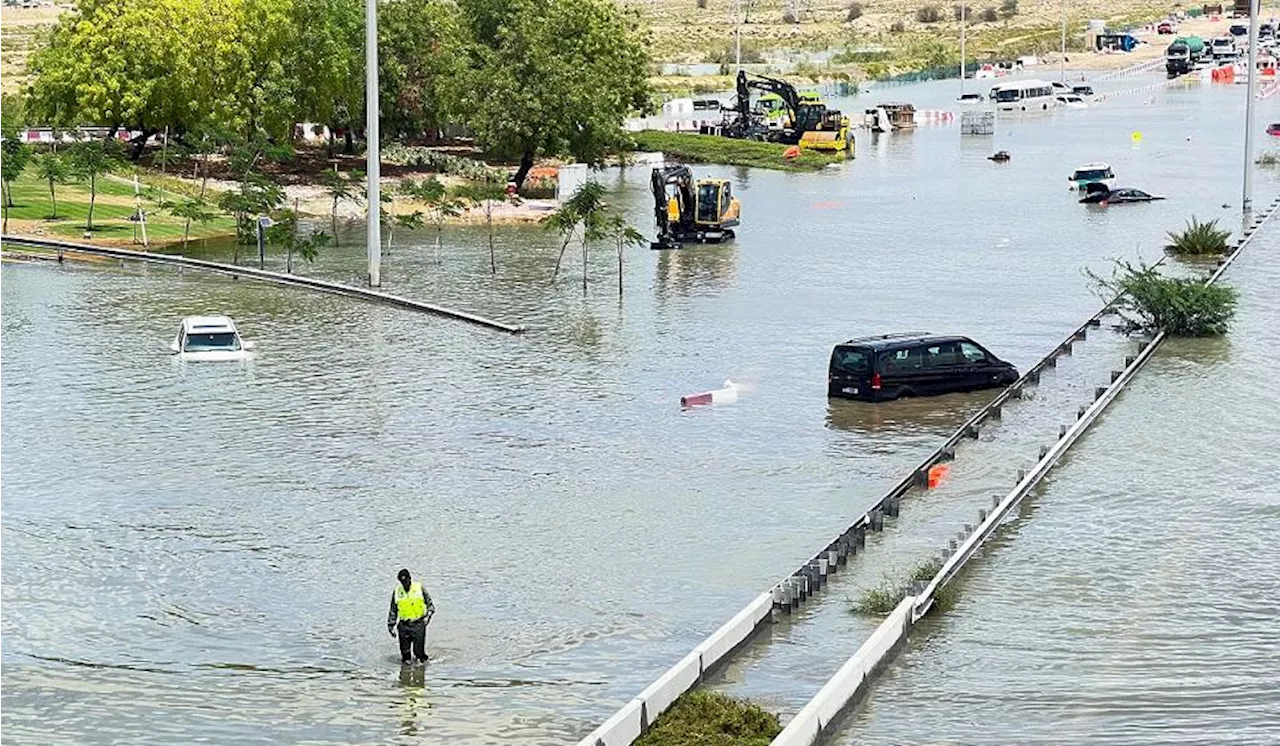 Clean-up begins after heavy UAE rain, floods; at least 1 dead